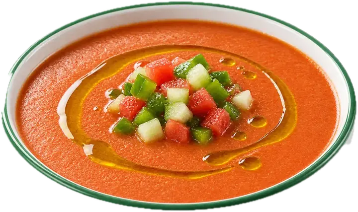 Cuenco de gazpacho andaluz con aceite de oliva y picadillo de pepino, pimiento y tomate